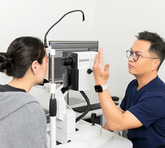 Robert Almanzor, ocular ultrasound technician, performing a diagnostic exam on a patient